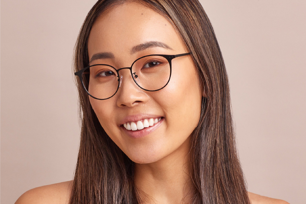 Ava eyeglasses frame worn by model.