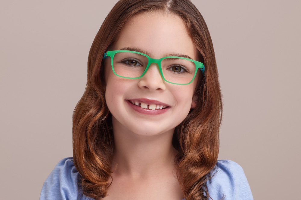 Stanislas eyeglasses frame worn by model.